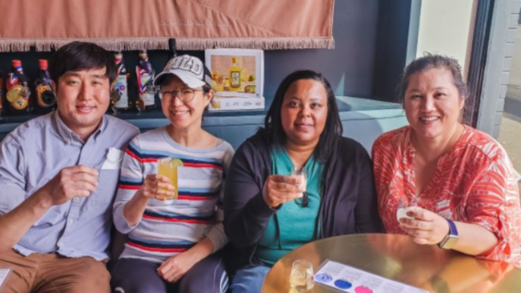 Guests trying out a new drink as part of the Portland by Mouth food tour.